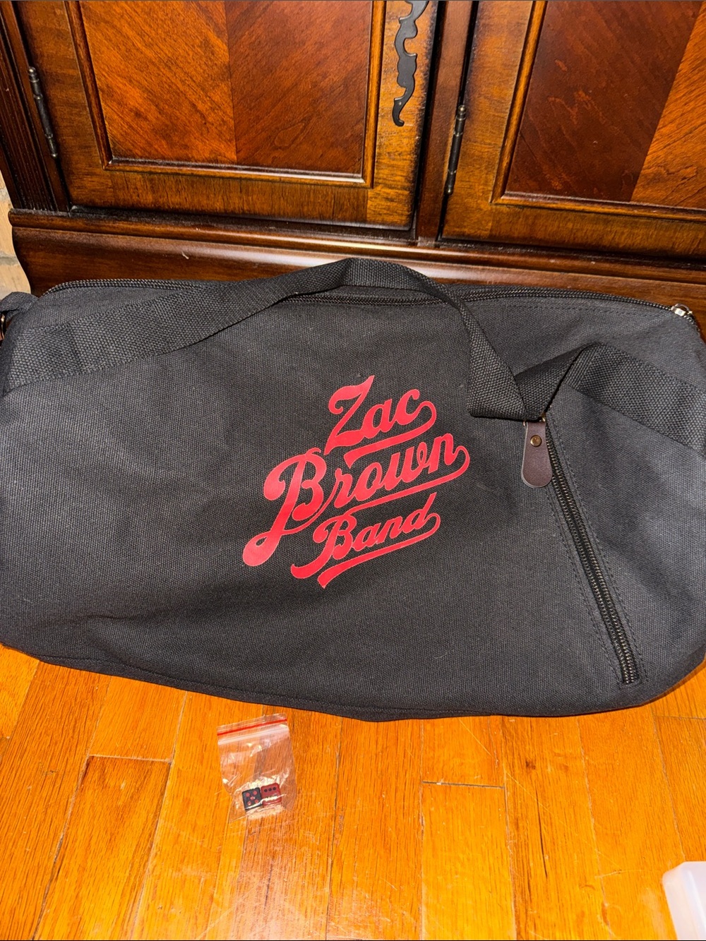 NWOT ZAC BROWN BLACK TRAVEL DUFFEL OVERNIGHT BAG AND DICE